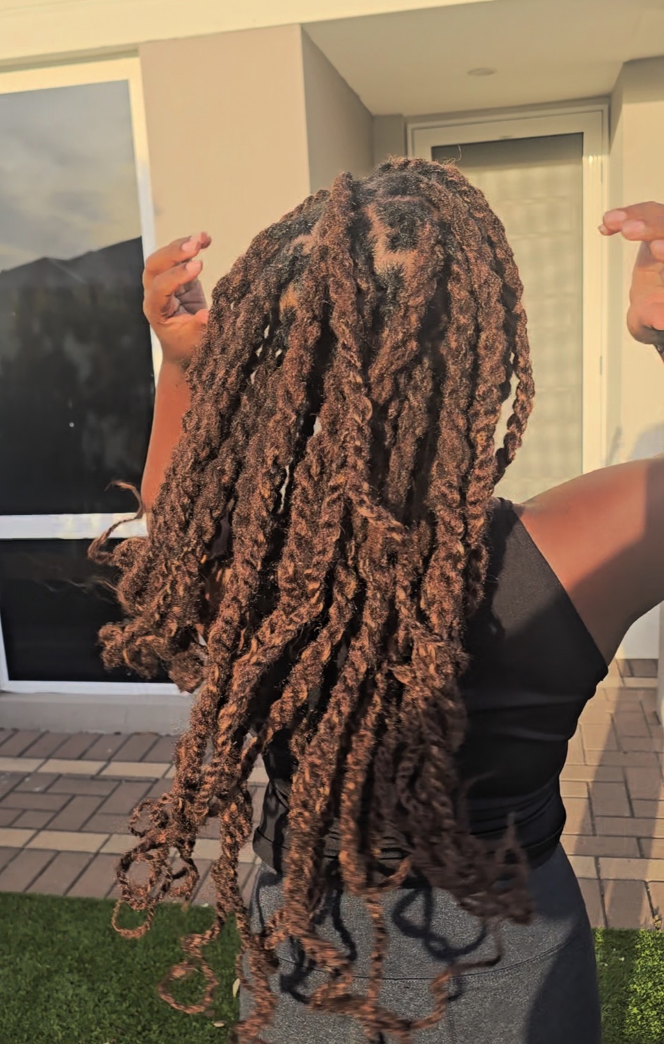 Loc extensions, boho curly style by Bees Locs